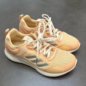 Adidas - women’s size 7.5 - light orange sneaker (worn once)